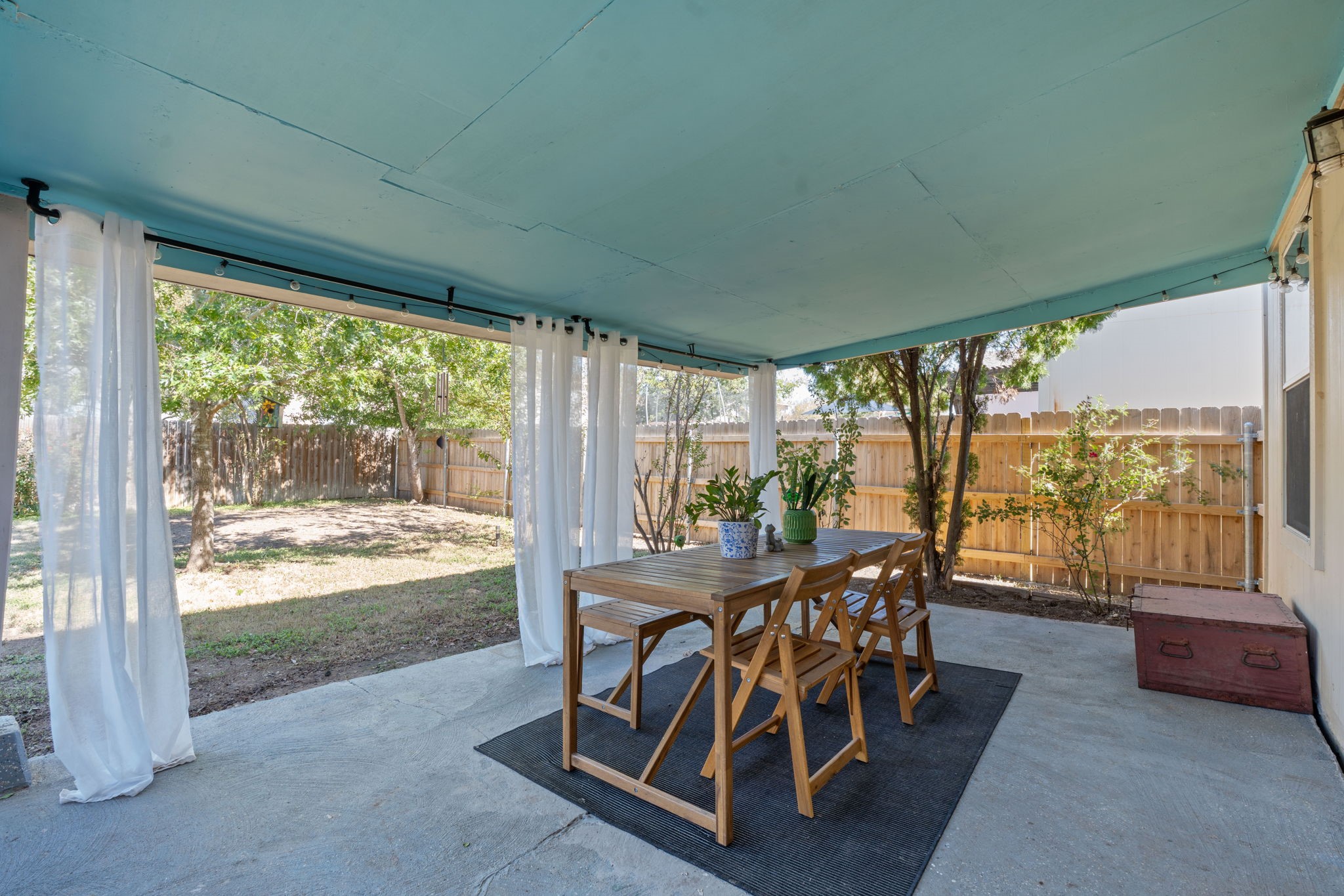 229 Black Forest Road Buda, TX 78610 - Photo 28 of 32 Covered patio in the backyard provides a perfect spot to unwind or host guests.