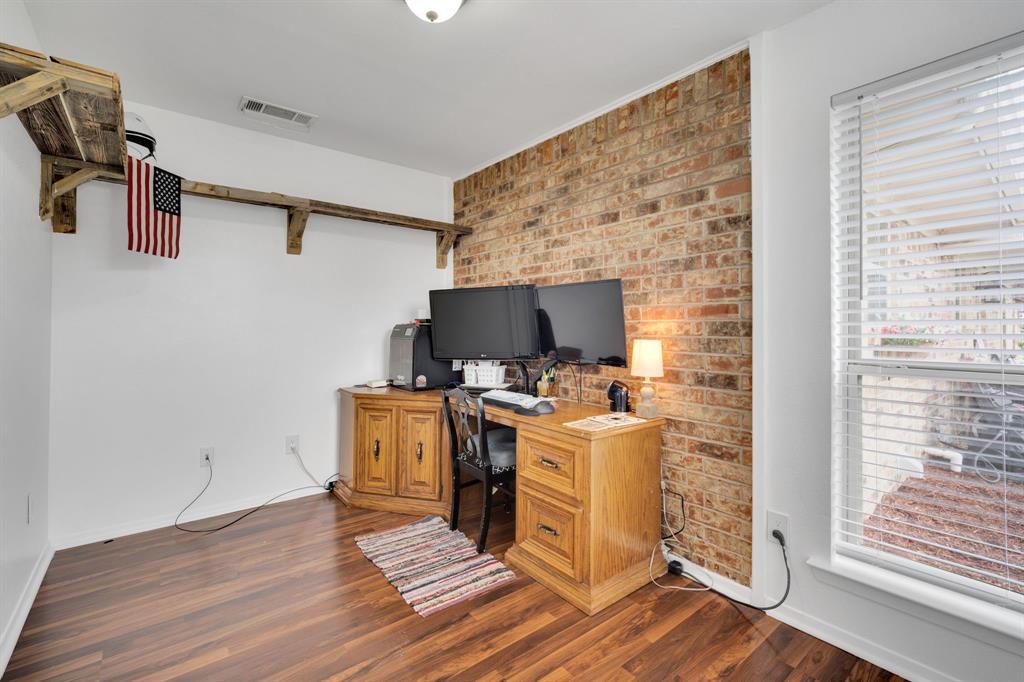 430 Carter Road Italy, TX 76651 - Photo 28 of 36 a view of a workspace with furniture and wooden floor