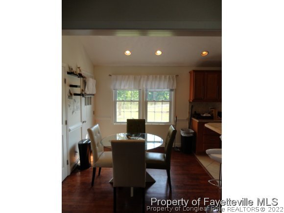 1013 Myra Road Raeford, NC 28376 - Photo 12 of 25 a view of a dining room with furniture and window
