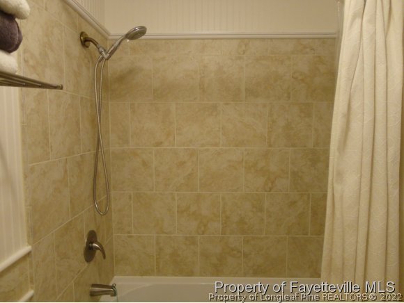 1013 Myra Road Raeford, NC 28376 - Photo 25 of 25 a bathroom with a shower