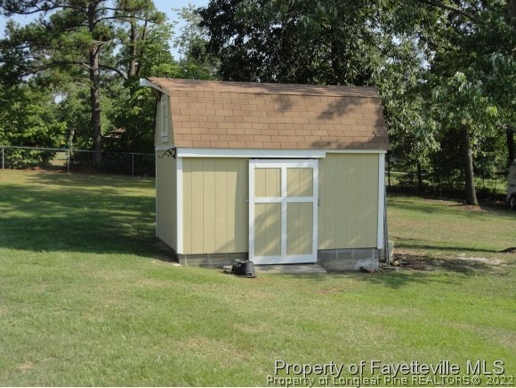 1013 Myra Road Raeford, NC 28376 - Photo 6 of 25 a view of backyard with green space