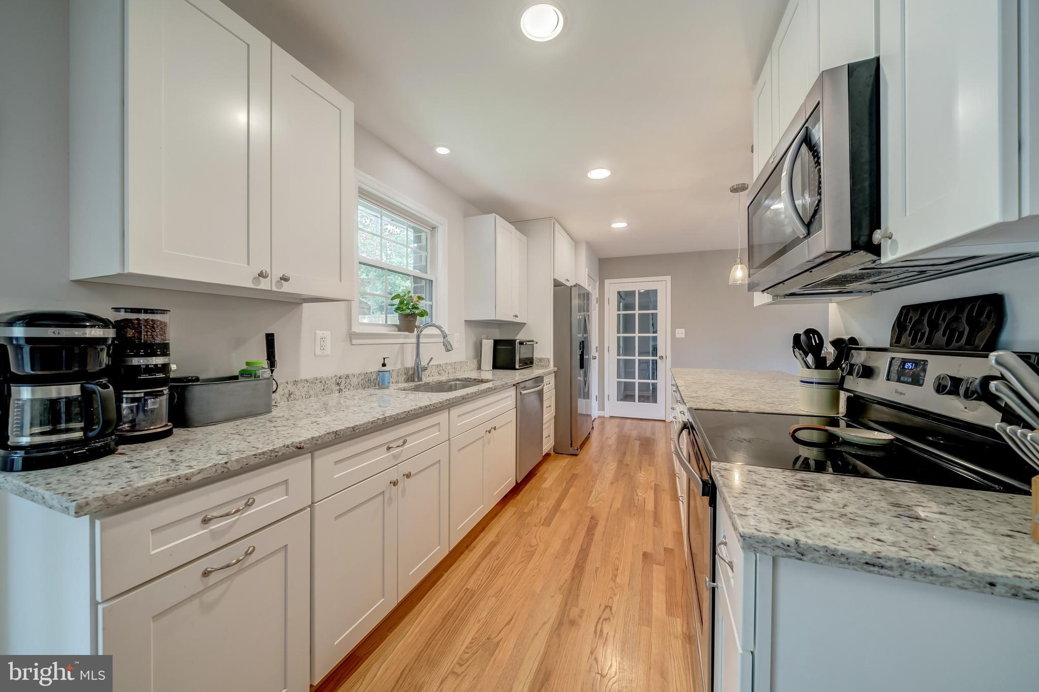 7026 Kelly Road Warrenton, VA 20187 - Photo 14 of 36 Kitchen leading to large family room