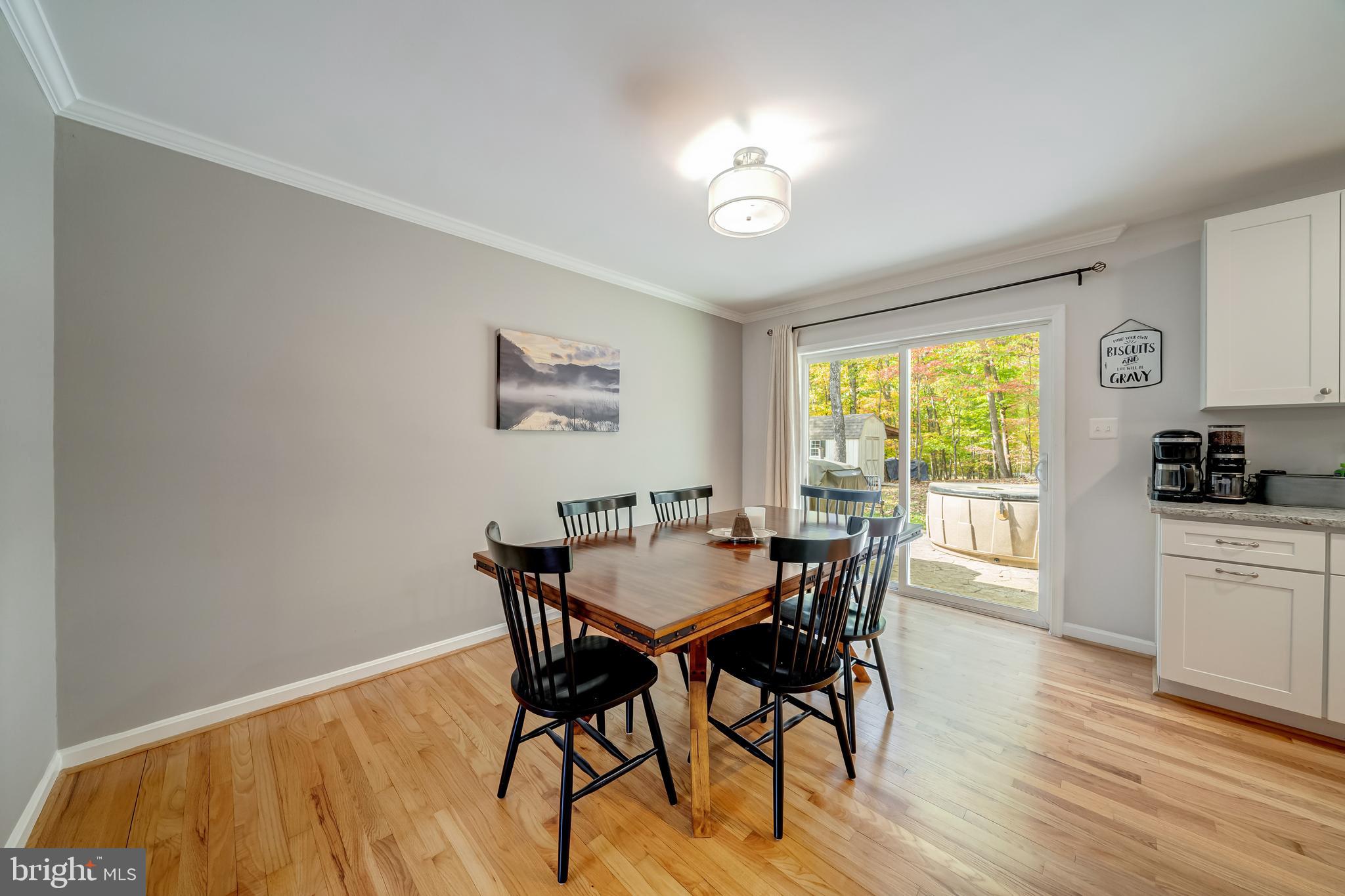 7026 Kelly Road Warrenton, VA 20187 - Photo 17 of 36 Dining room with sliding doors to outside
