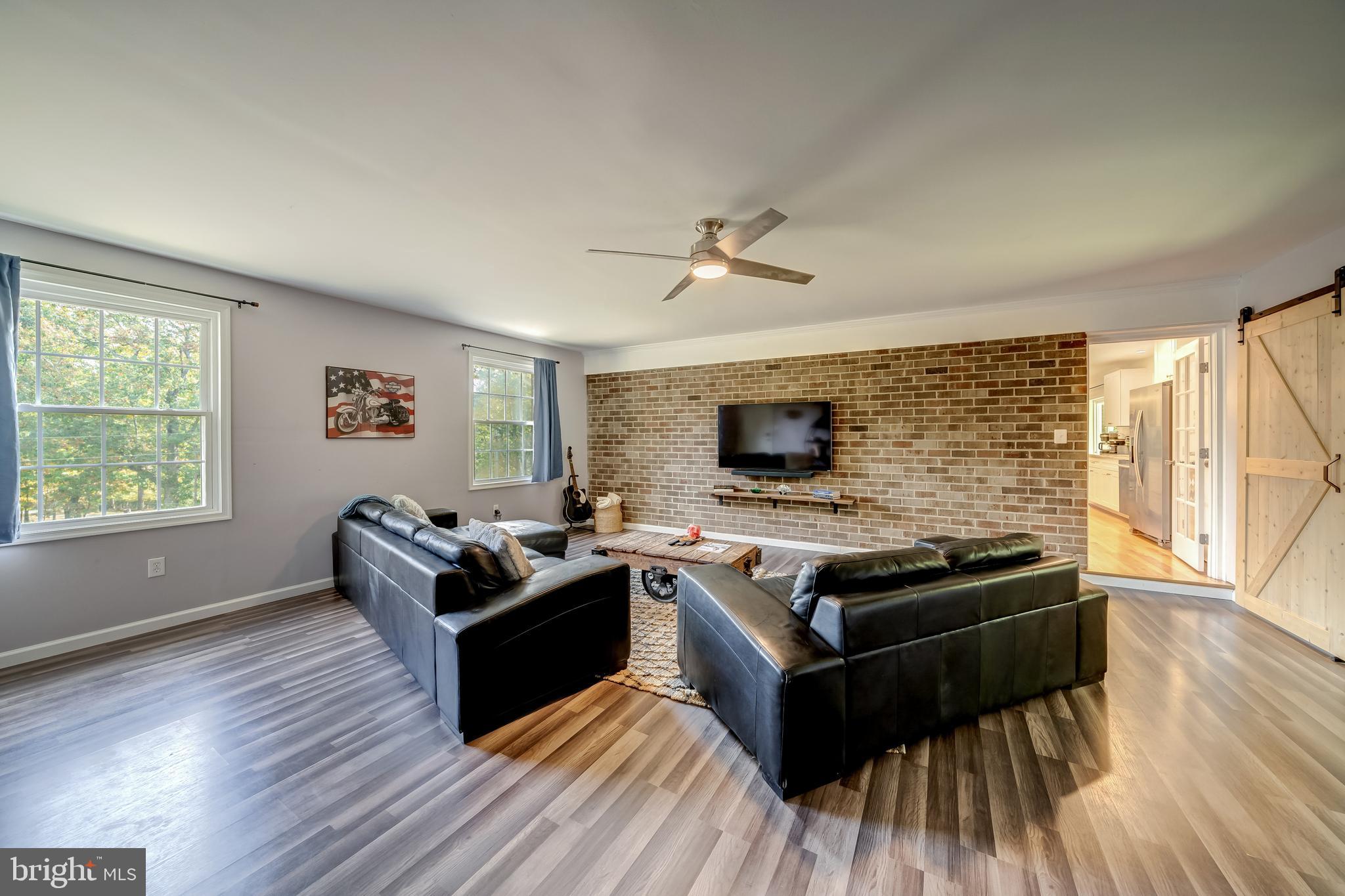 7026 Kelly Road Warrenton, VA 20187 - Photo 20 of 36 Interior brick wall