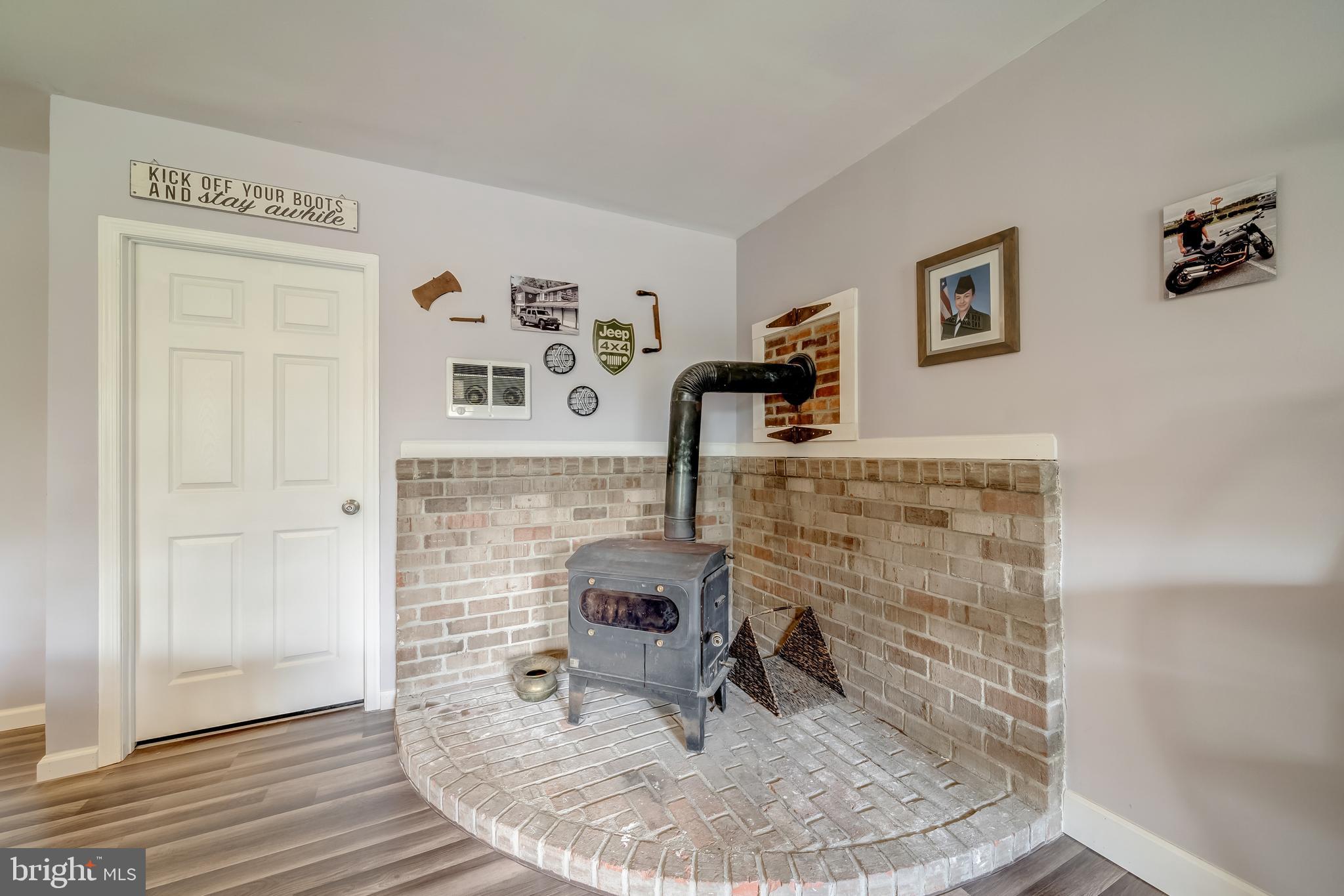 7026 Kelly Road Warrenton, VA 20187 - Photo 21 of 36 Convenient wood stove