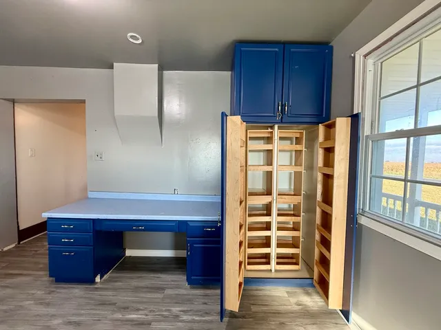 a room with furniture and windows