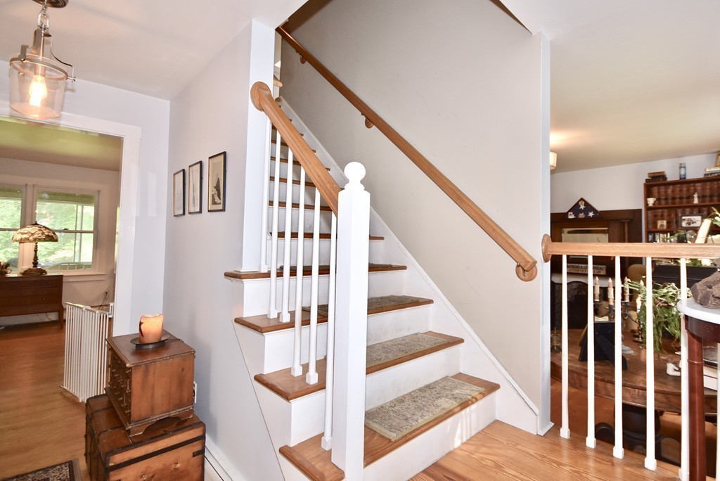 193 High Street Rochester, MA 02770 - Photo 12 of 25 a view of entryway and hall with wooden floor