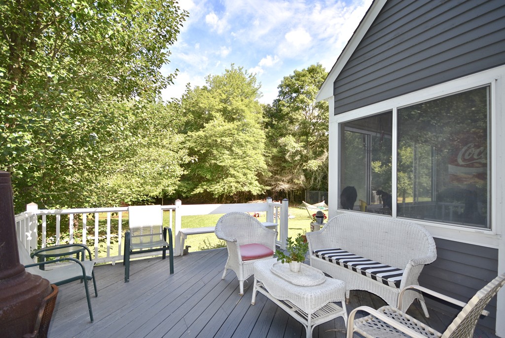 193 High Street Rochester, MA 02770 - Photo 21 of 25 a view of a patio with couple of chairs and couch
