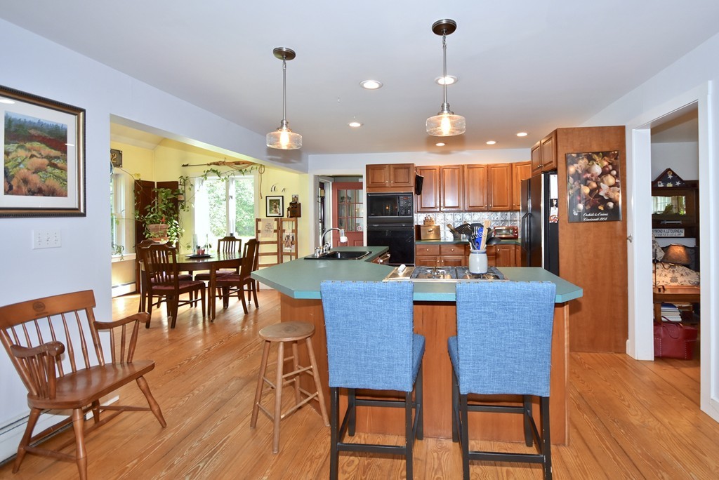 193 High Street Rochester, MA 02770 - Photo 5 of 25 a view of a dining room with furniture window and wooden floor