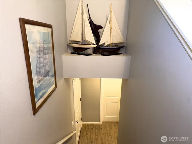 a view of front door with a mirror