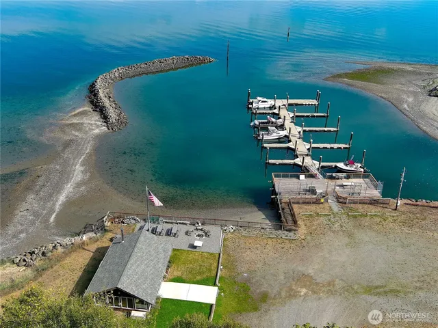an aerial view of a house with outdoor space sitting space