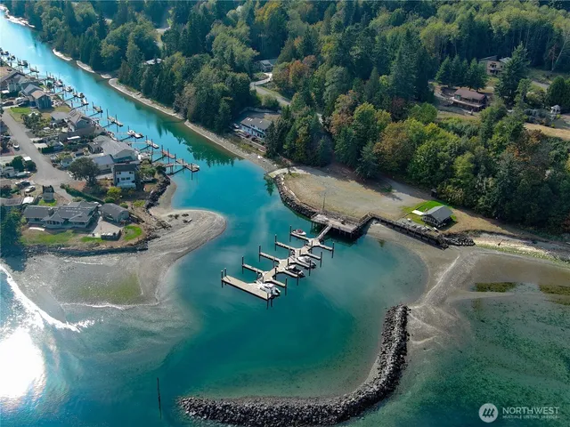 an aerial view of a house with outdoor space
