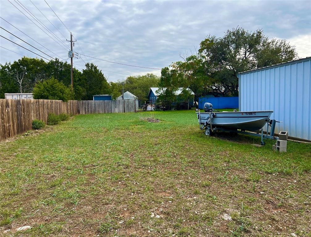 15608 Checotah Drive Austin, TX 78734 - Photo 17 of 38 a view of a backyard with a garden