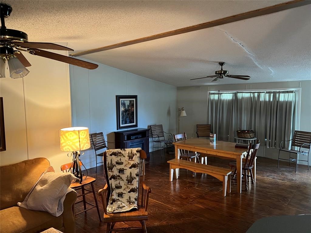 15608 Checotah Drive Austin, TX 78734 - Photo 18 of 38 a view of a livingroom with furniture window and wooden floor