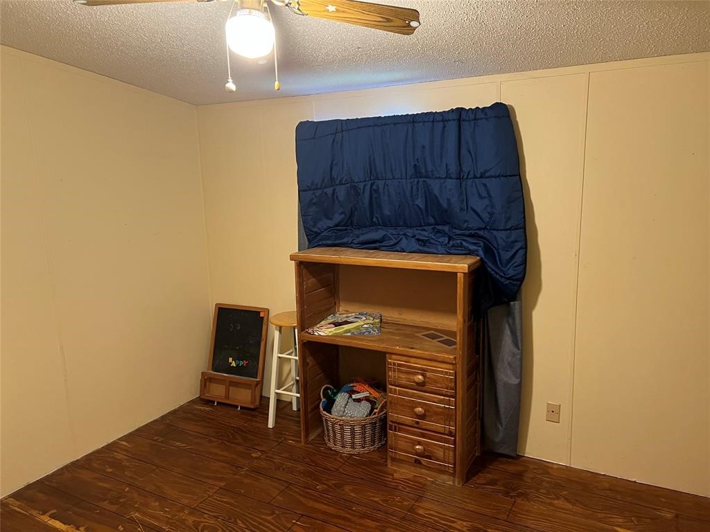 15608 Checotah Drive Austin, TX 78734 - Photo 25 of 38 a view of a livingroom with furniture and wooden floor