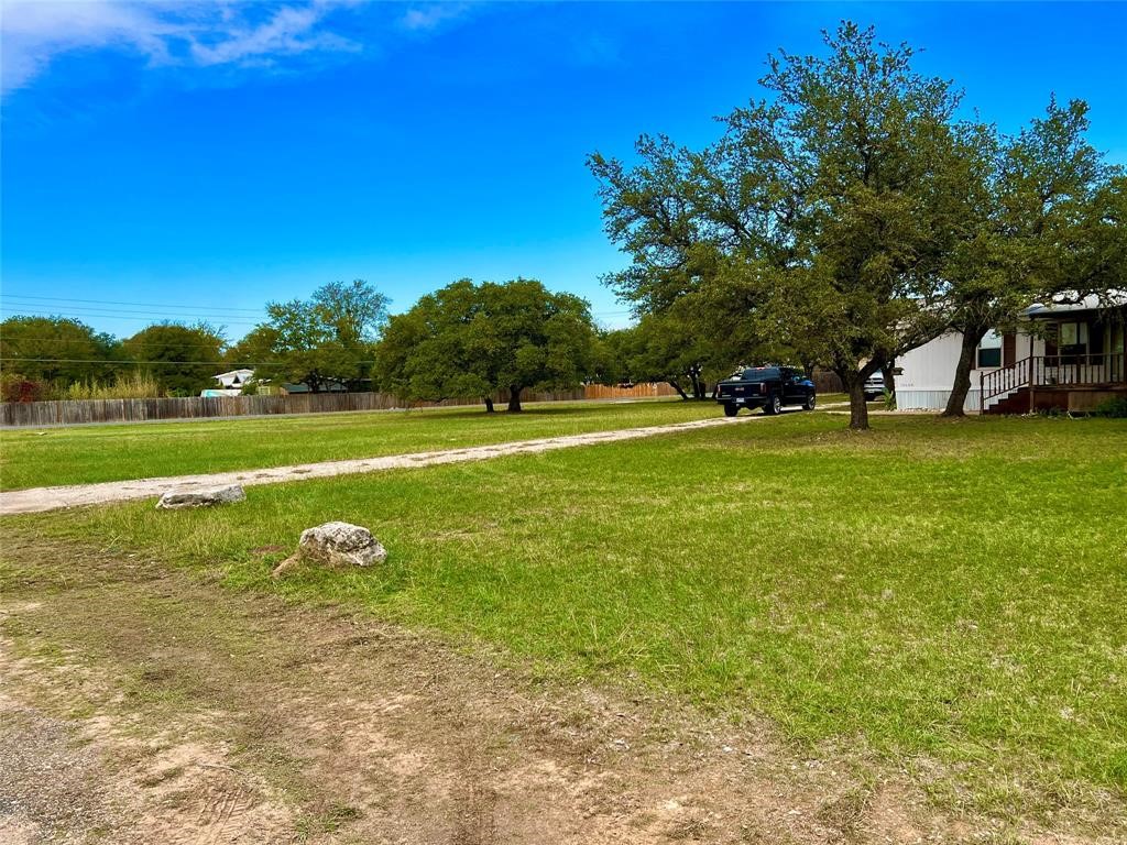 15608 Checotah Drive Austin, TX 78734 - Photo 9 of 38 a view of a field with an trees