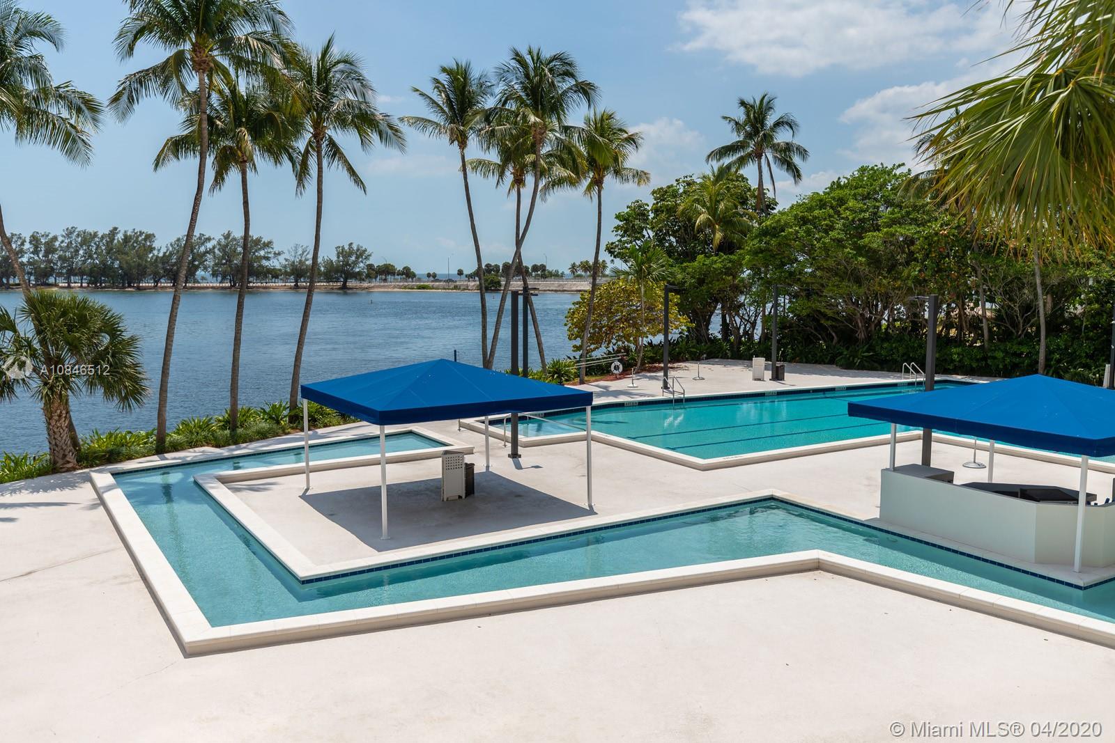 2333 Brickell Avenue, Unit TSD Miami, FL 33129 - Photo 39 of 44 a view of a backyard with a sitting area