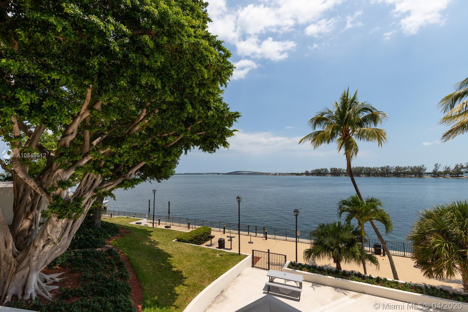 2333 Brickell Avenue, Unit TSD Miami, FL 33129 - Photo 41 of 44 a view of a lake with a palm tree