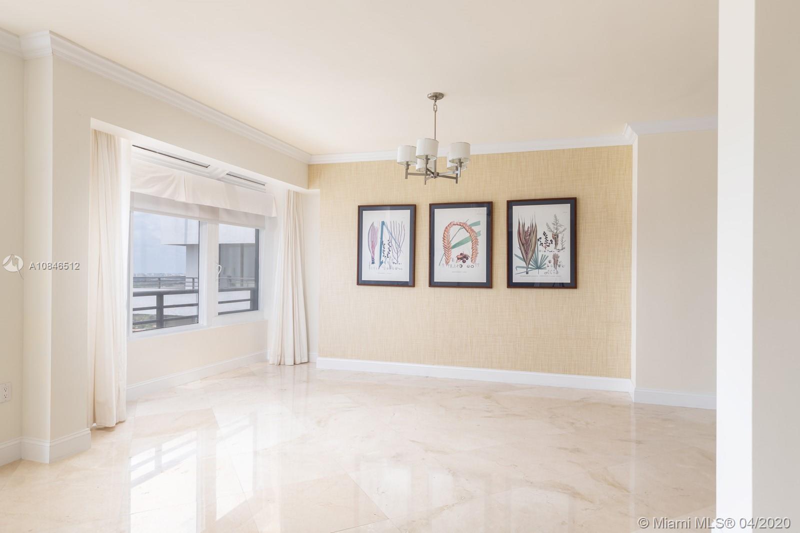 2333 Brickell Avenue, Unit TSD Miami, FL 33129 - Photo 9 of 44 a view of a room with large windows