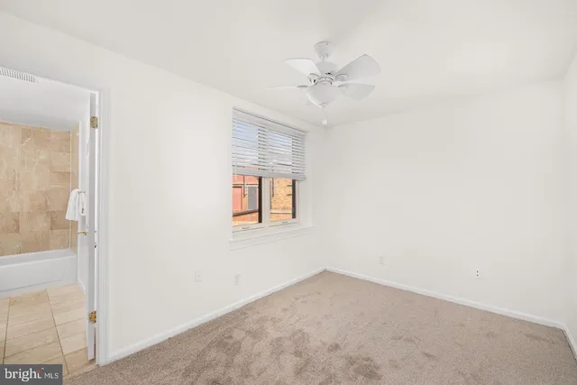 a bathroom with a sink a bathtub and a shower