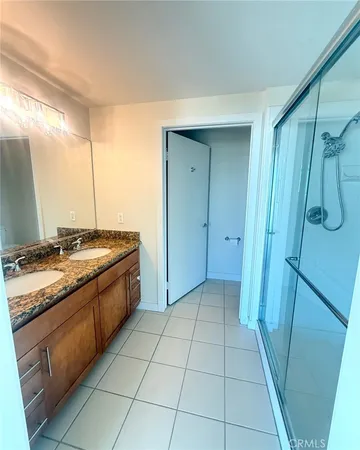 a kitchen with granite countertop a sink and a stove