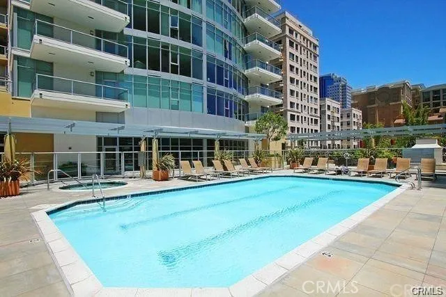 a view of pool with outdoor seating