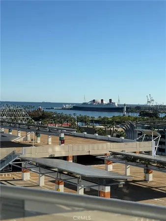 a view of a water fountain and an ocean