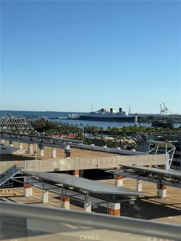 a view of a water fountain and an ocean