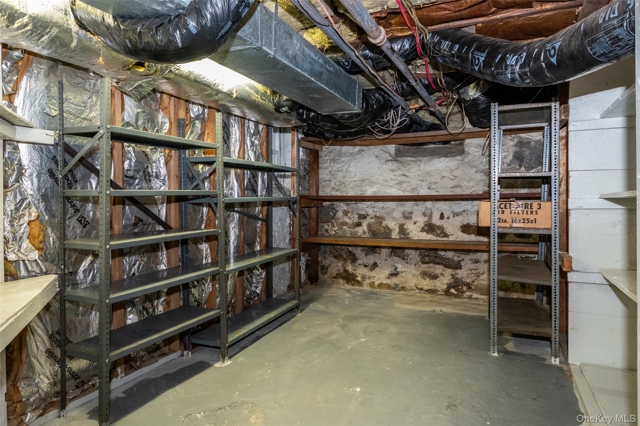 82 Clove Road New Rochelle, NY 10801 - Photo 31 of 39 a view of store room with racks