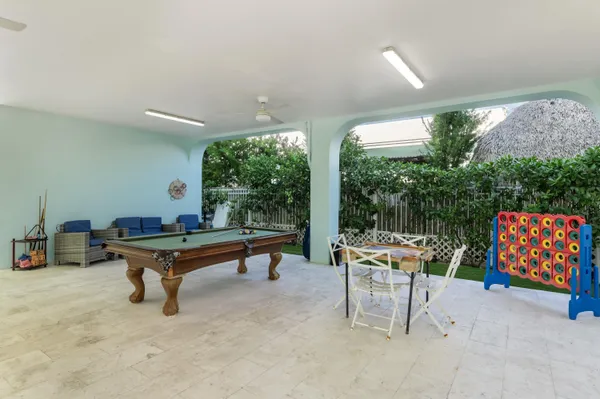 a reading room with furniture and a gate