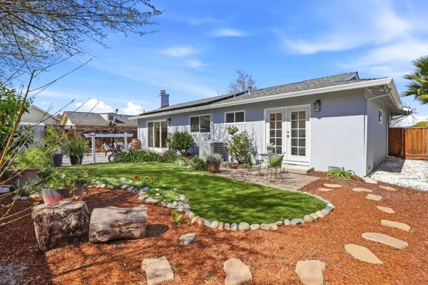 a view of a chairs and tables in the patio