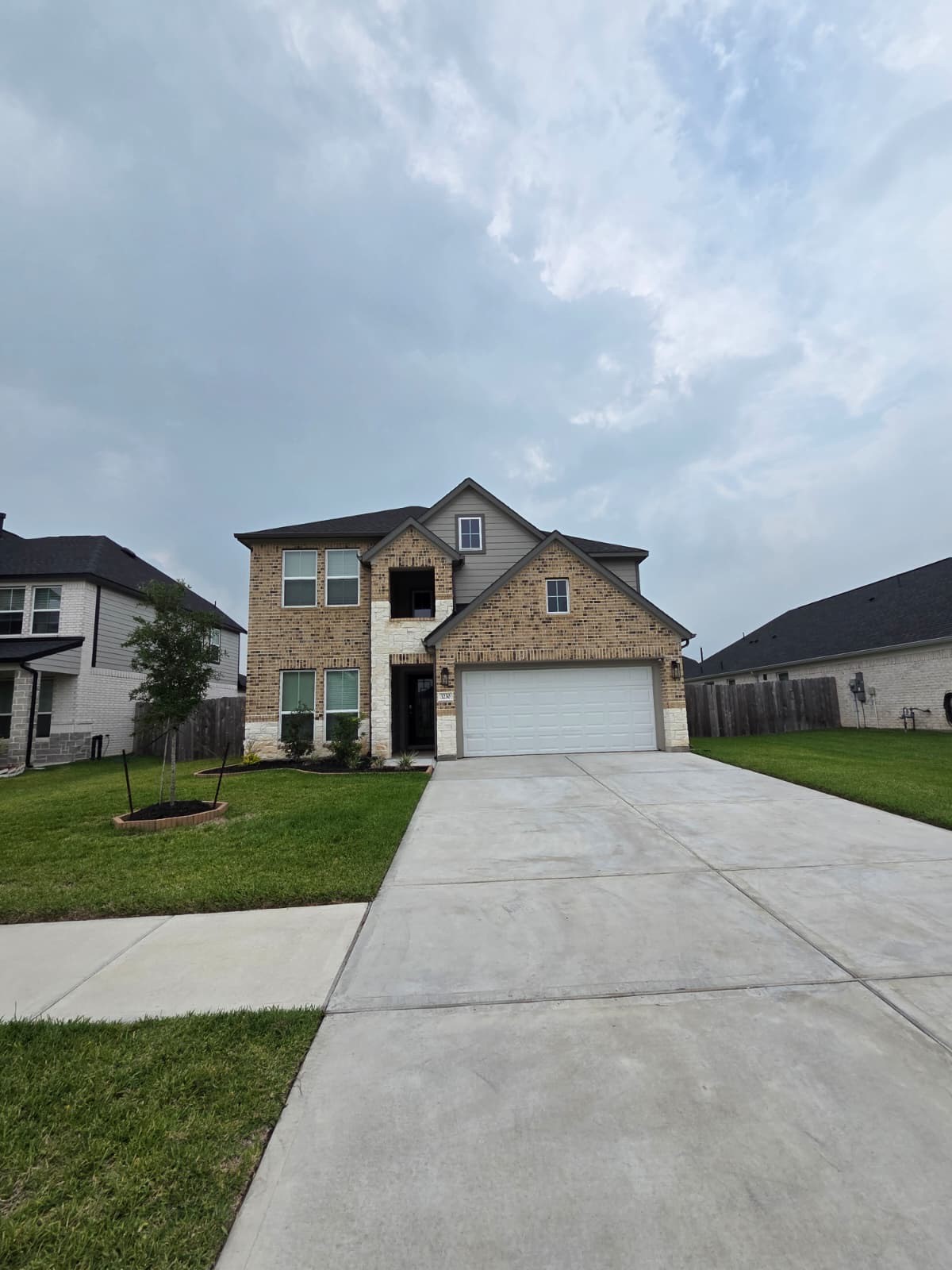 3230 Tilley Drive Rosenberg, TX 77471 - Photo 1 of 17 a front view of a house with a yard and garage