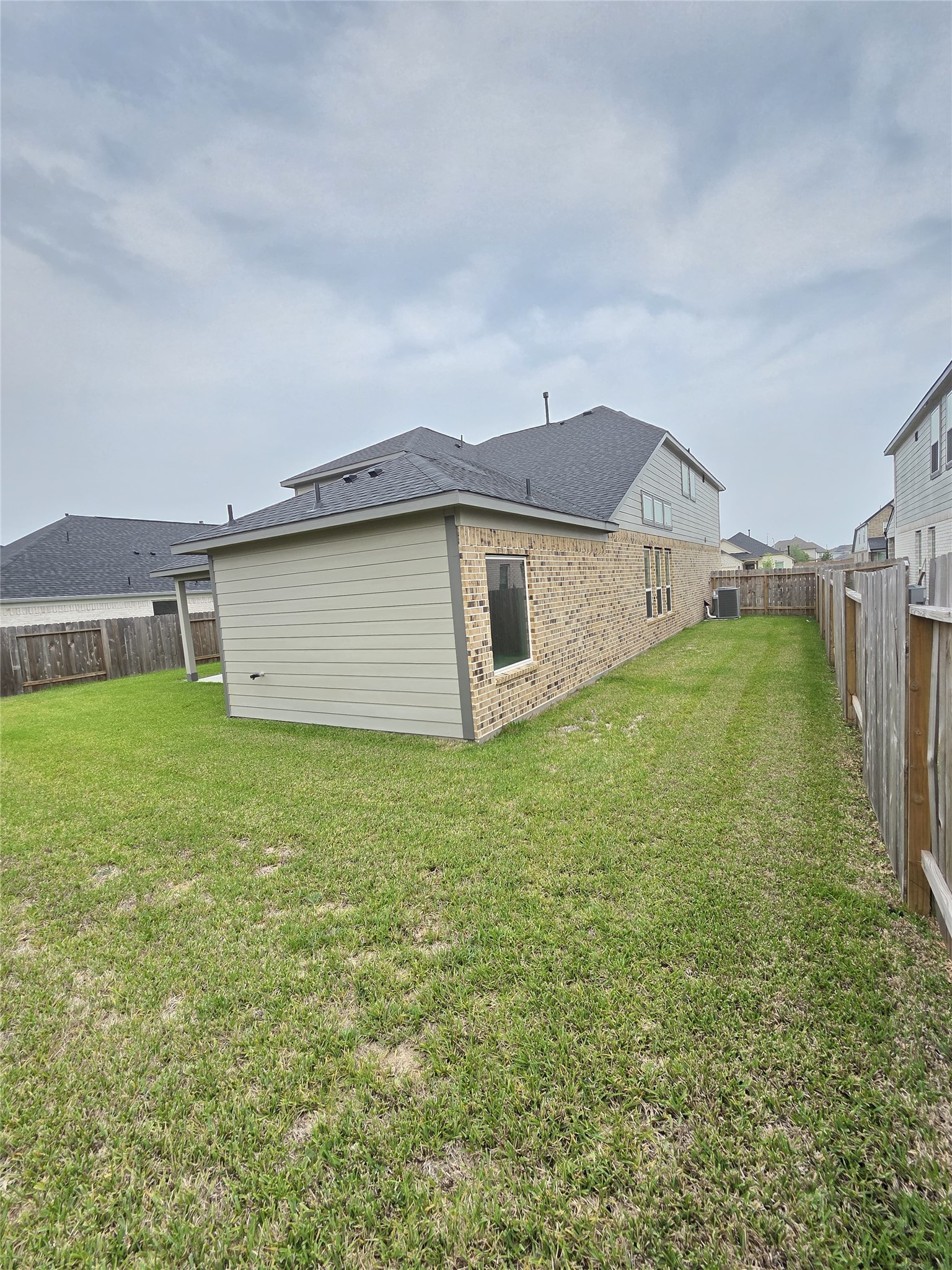 3230 Tilley Drive Rosenberg, TX 77471 - Photo 11 of 17 a view of a house with a yard