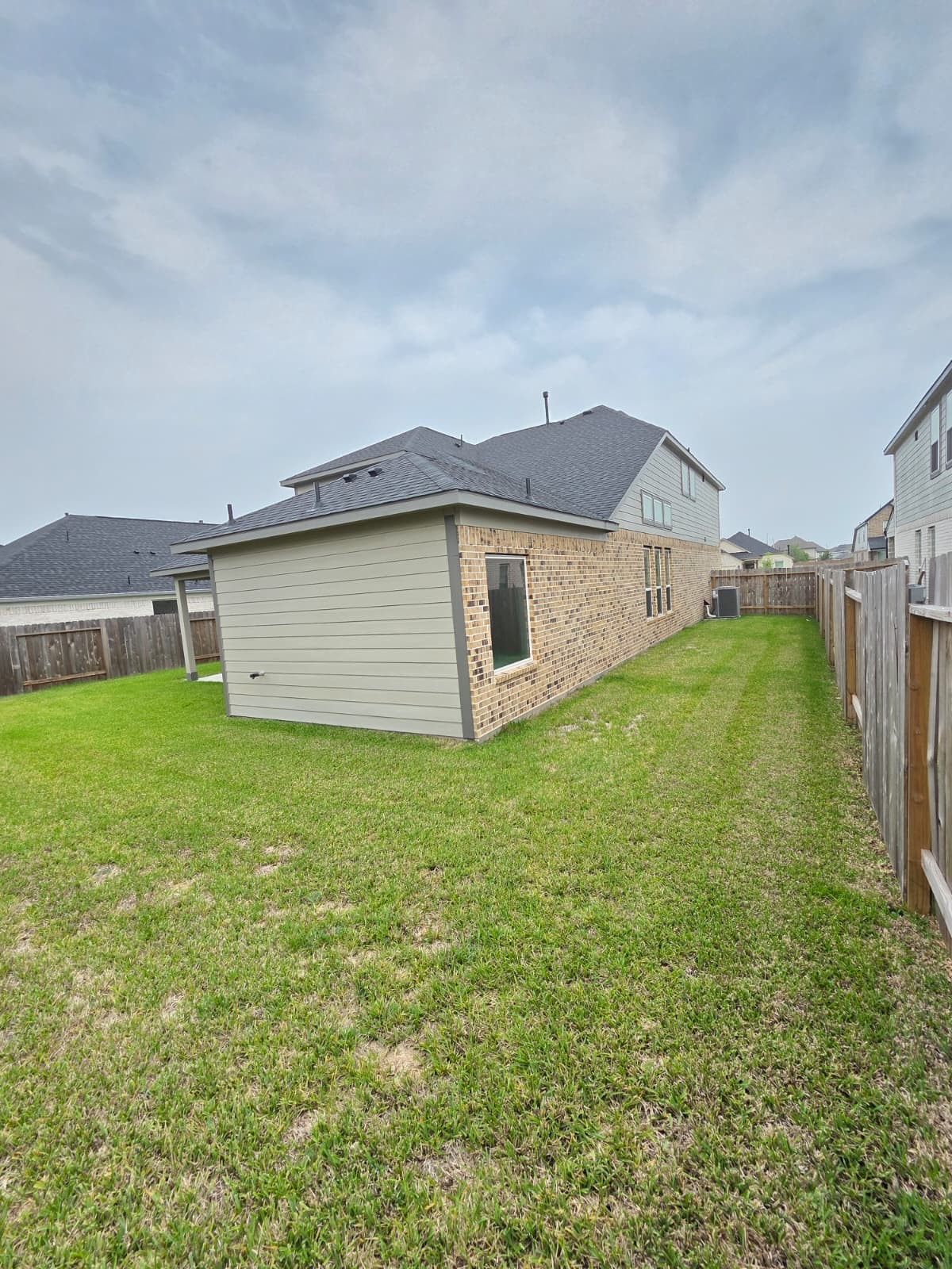3230 Tilley Drive Rosenberg, TX 77471 - Photo 5 of 17 a view of a house with a yard