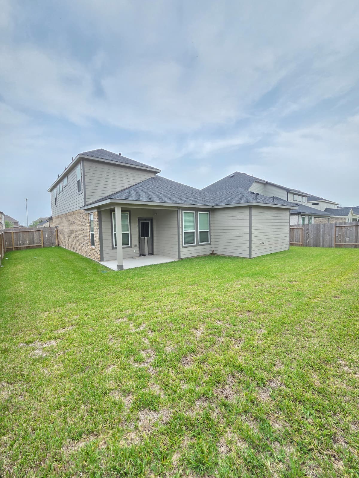 3230 Tilley Drive Rosenberg, TX 77471 - Photo 6 of 17 a front view of a house with garden