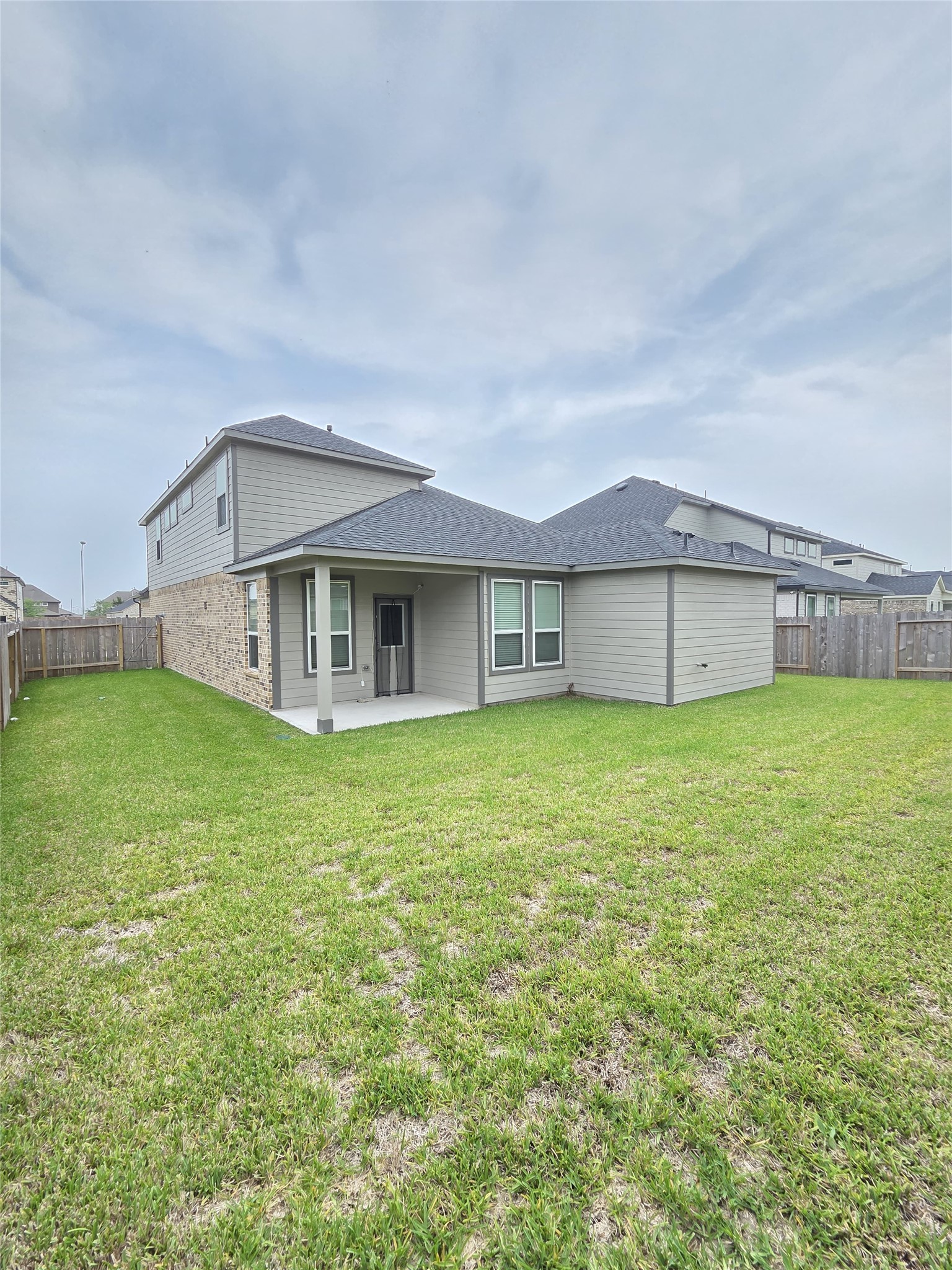3230 Tilley Drive Rosenberg, TX 77471 - Photo 8 of 17 a view of a house with a garden and deck