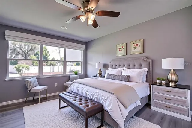 a bedroom with a bed and a couch