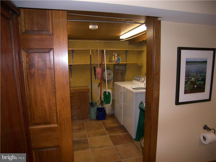 39 Bright Road Hatboro, PA 19040 - Photo 11 of 24 a bathroom with a sink and mirror