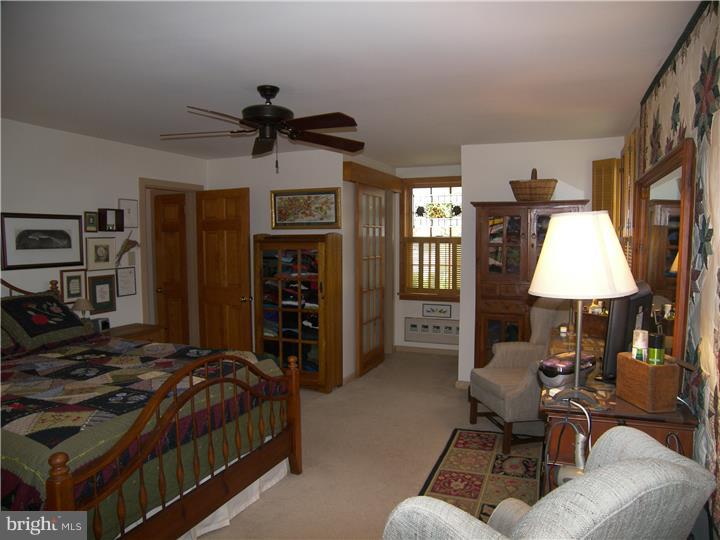 39 Bright Road Hatboro, PA 19040 - Photo 12 of 24 a living room with furniture and a flat screen tv