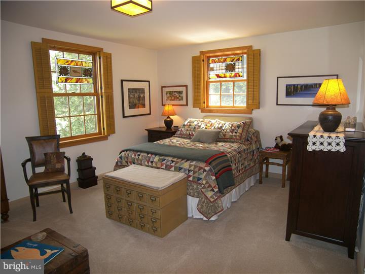 39 Bright Road Hatboro, PA 19040 - Photo 13 of 24 a bedroom with a bed and a couch