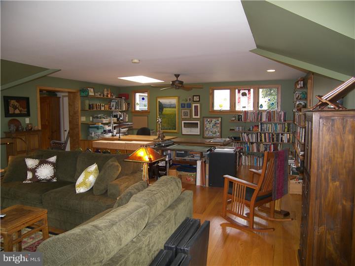39 Bright Road Hatboro, PA 19040 - Photo 15 of 24 a living room with furniture a dining table and chairs
