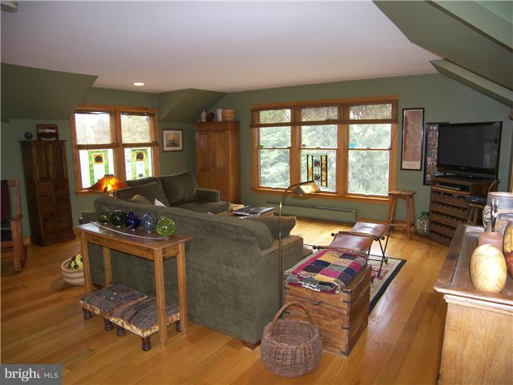 39 Bright Road Hatboro, PA 19040 - Photo 16 of 24 a living room with furniture and a flat screen tv