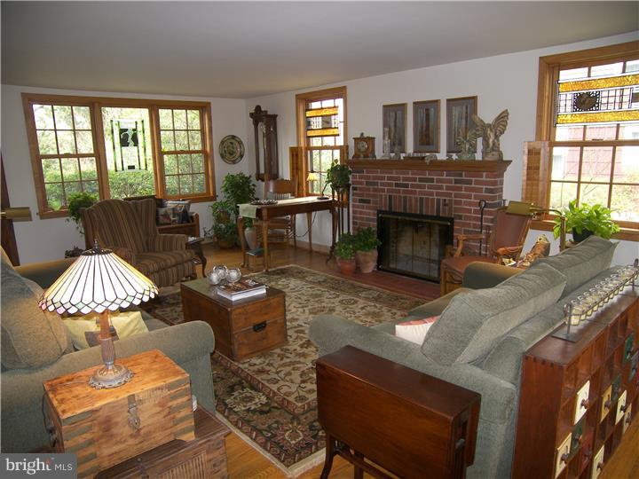 39 Bright Road Hatboro, PA 19040 - Photo 5 of 24 a living room with furniture fireplace and window
