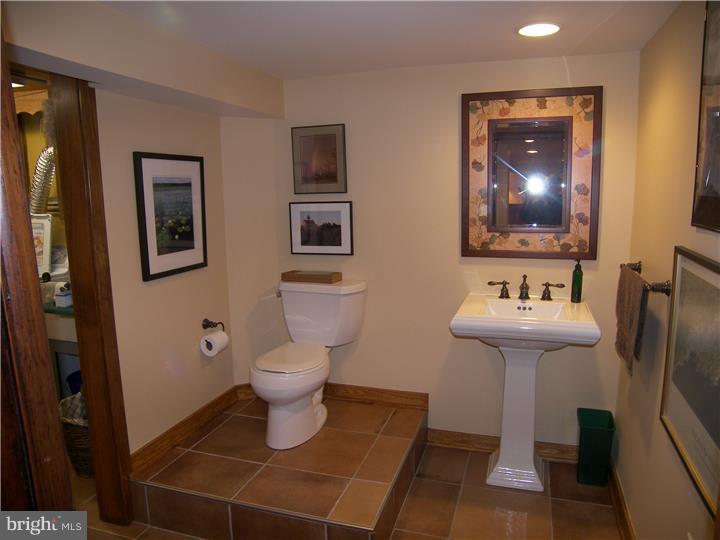 39 Bright Road Hatboro, PA 19040 - Photo 10 of 24 a bathroom with a sink toilet and a mirror