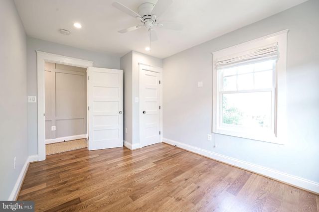 a view of balcony with wooden floor