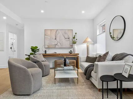 a living room with furniture and a couch