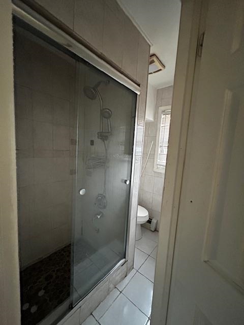 622 Liberty Avenue, Unit 1 Jersey City, NJ 07307 - Photo 11 of 14 a bathroom with a glass door shower