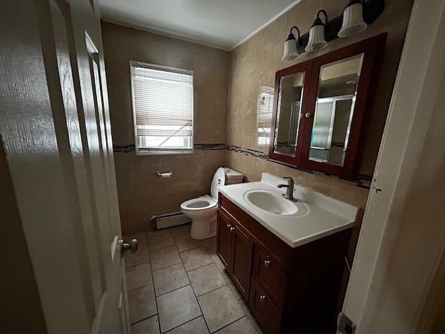 622 Liberty Avenue, Unit 1 Jersey City, NJ 07307 - Photo 12 of 14 a bathroom with a sink a toilet and mirror