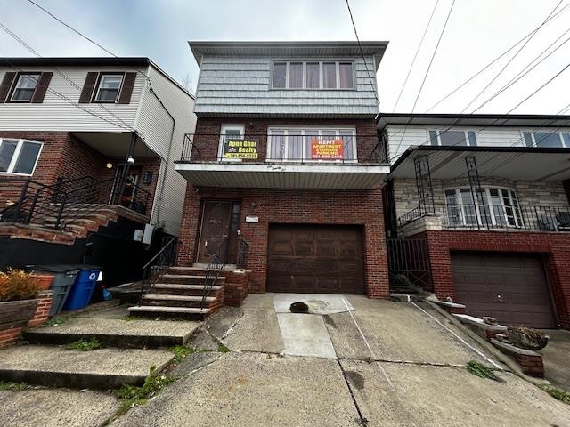 622 Liberty Avenue, Unit 1 Jersey City, NJ 07307 - Photo 2 of 14 a front view of a house with entryway
