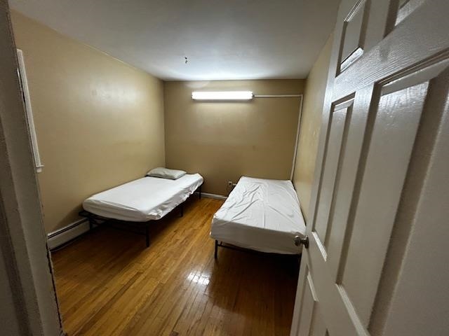 622 Liberty Avenue, Unit 1 Jersey City, NJ 07307 - Photo 6 of 14 a bathroom with a sink and mirror